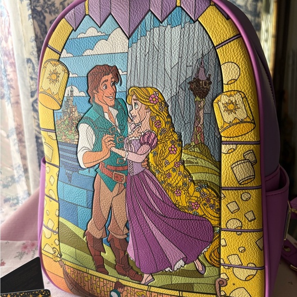Loungefly Handbags - Loungefly Purple and Yellow Backpack